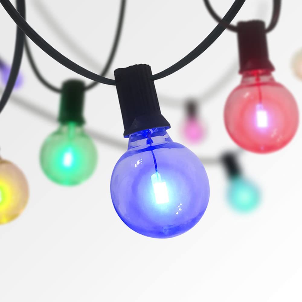 Illuminated RGB globe bulbs hanging from a black string cable